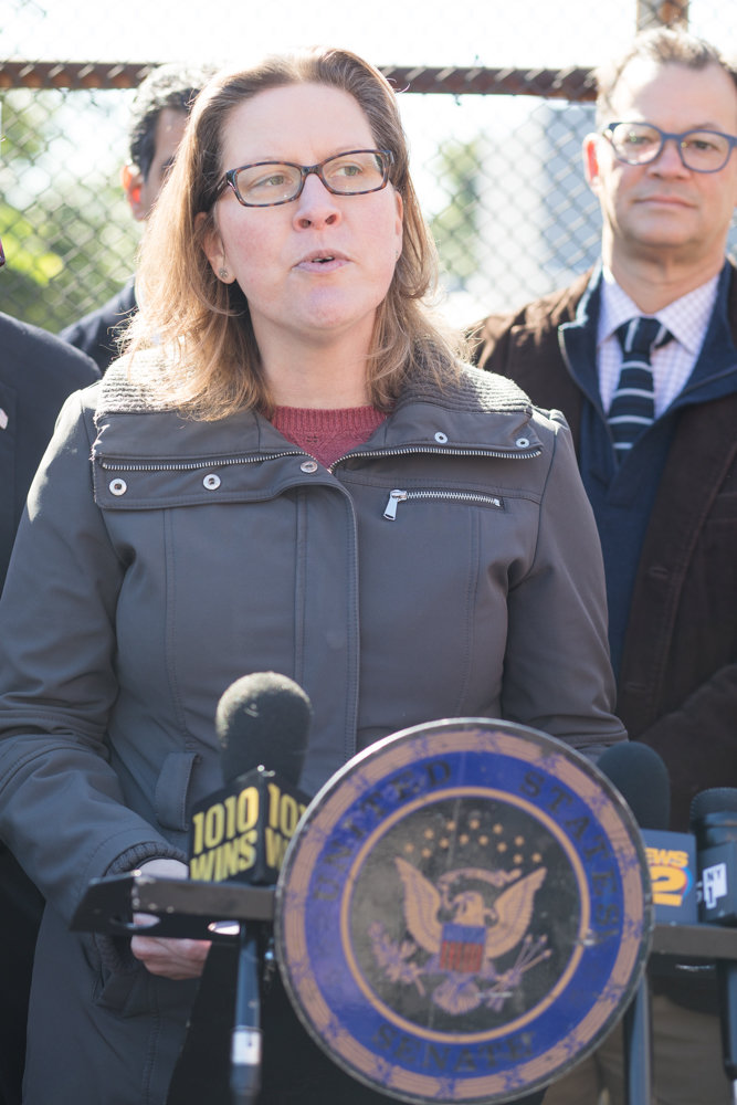 Friends of Van Cortlandt Park executive director Christina Taylor speaks at a press conference Oct. 18 regarding a mile-long strip of land, owned by Florida-based CSX Corp., on Oct. 18. Taylor is enthusiastic about the eventual merger of her organization with the Van Cortlandt Park Conservancy, to create a united organization known as the Van Cortlandt Park Alliance.