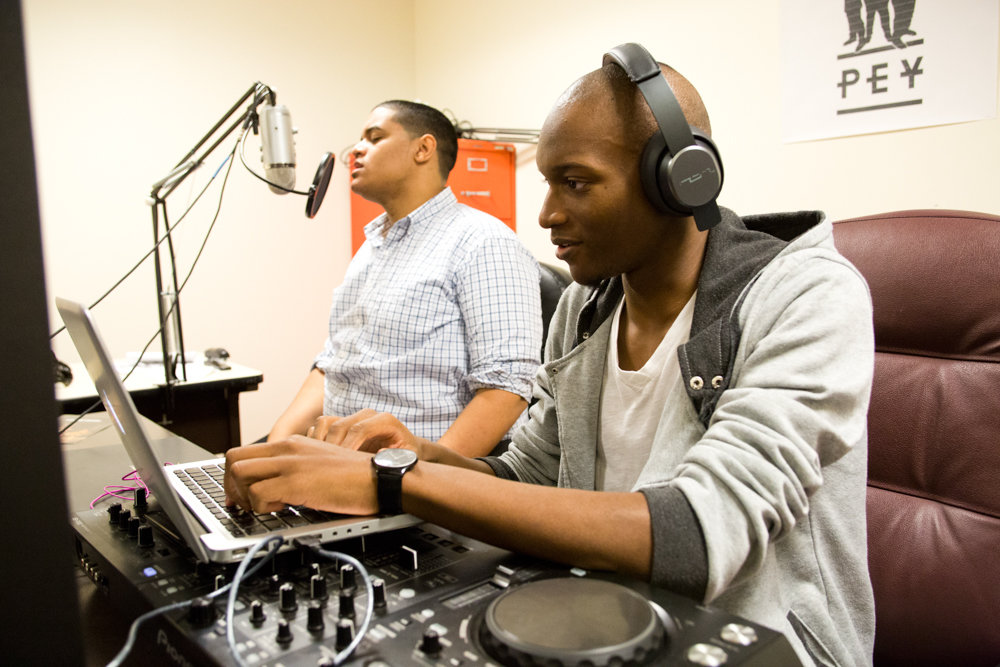 Erick Jhon Peguero, left, and Poche Wilson host a program on Lehman College’s student-run radio station in 2016. Whereas Lehman’s radio station exists within a larger network of legitimate radio operations, pirate radio operators continue to broadcast illegally, including, apparently, near Spuyten Duyvil.