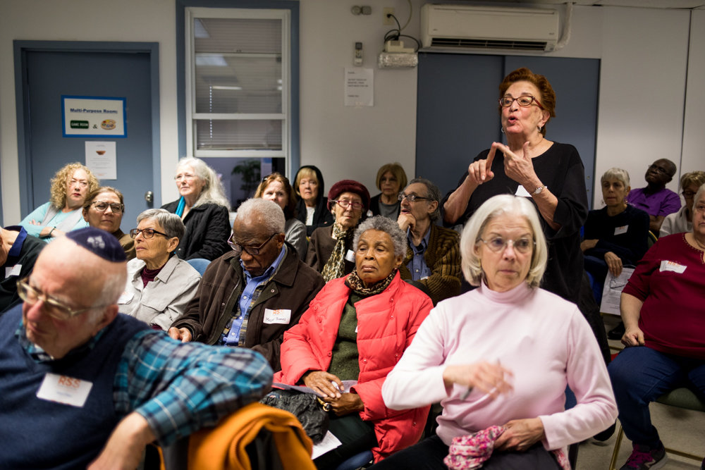 Judith Green asks state Sen. Alessandra Biaggi about how the New York Health Act will be funded at an information session at RSS-Riverdale Senior Services last week.