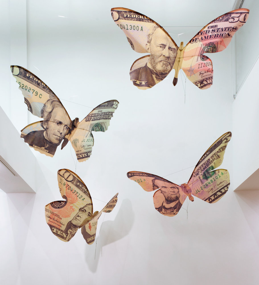 Erika Harrsch’s ‘Currency Kites’ flies high inside of Lehman College Art Gallery as part of its ‘Mediums of Exchange’ exhibition exploring economic, sociological and psychological viewpoints toward money.