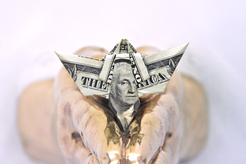 Eugenio Merino uses origami to bring attention to all sorts of political imagery on the American dollar in his collection, ‘In God We Trust, Everyone Else Pays Cash.’ Merino’s works are on display at Lehman College Art Gallery through May 4.