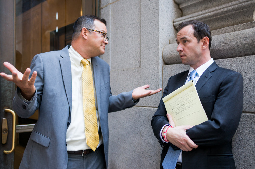 Councilman Andrew Cohen speaks with former Community Board 8 chair Dan Padernacht after a public hearing on the proposed deal with Stagg Group about a transitional housing facility in 2017. Cohen’s city council environmental score slipped this year because he wasn’t quite ready to sponsor a couple measures related to electric bicycles and scooters.
