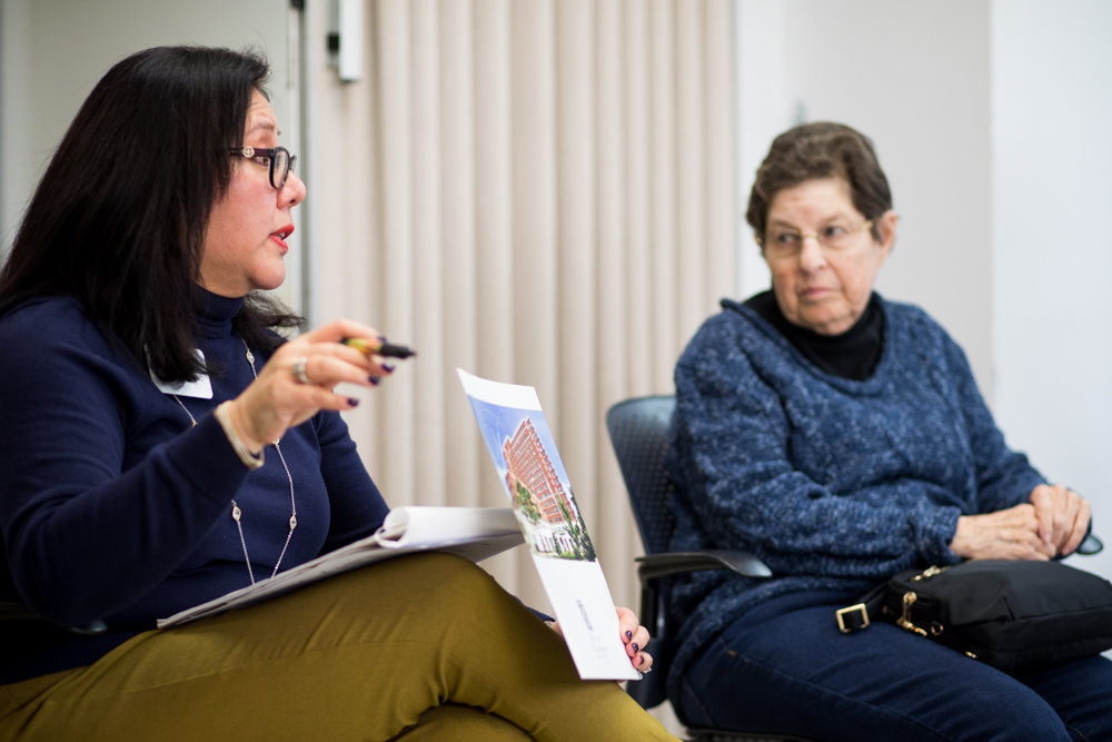 Social worker Selina Ng leads a meeting of the Savvy Solos Club at RSS-Riverdale Senior Services. The senior center recently launched the club to help members discuss issues affecting them when it comes to family members, medical emergencies and health care, as well as creating a support network.
