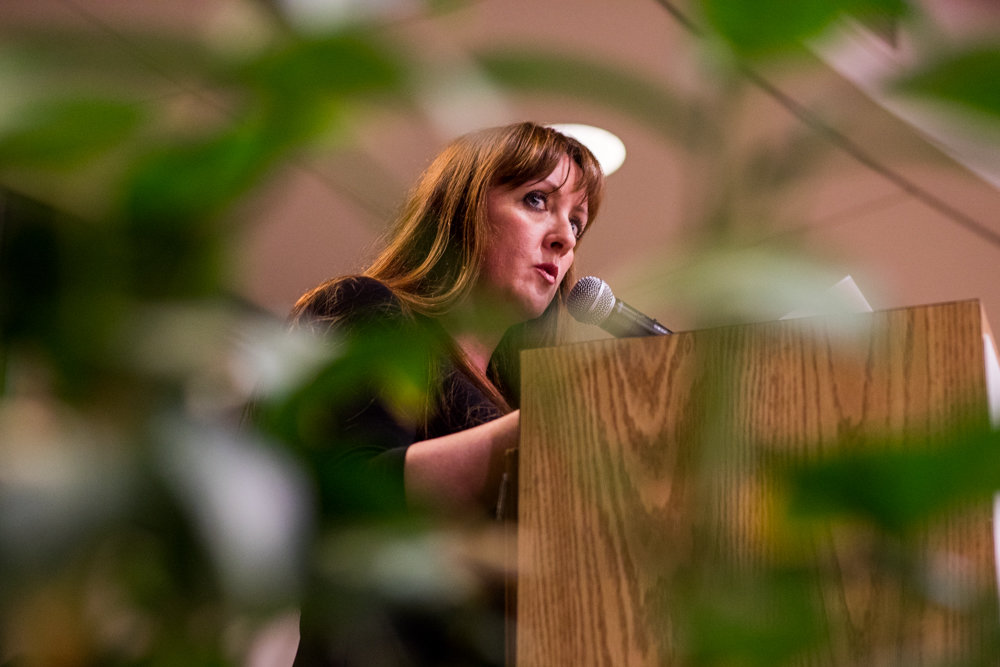 Deborah Kahan Kolb reads her poem 'Brandenburg Gate' during 'Write Me,' a poetry event in remembrance of the Holocaust at the Hebrew Home at Riverdale.
