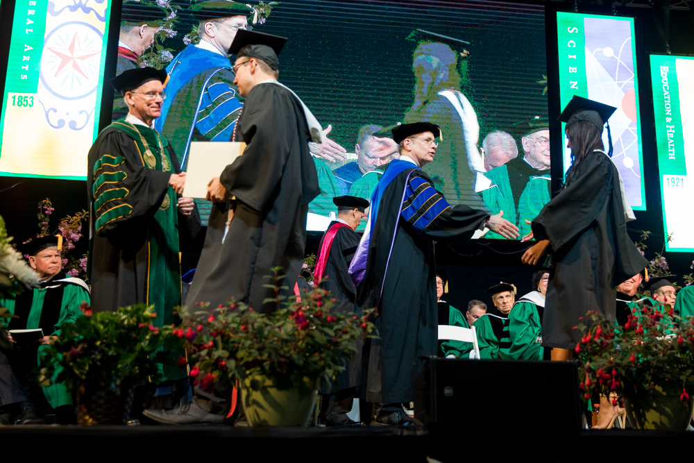 Graduating seniors in Manhattan College’s Class of 2019 walk on stage to receive their degrees.