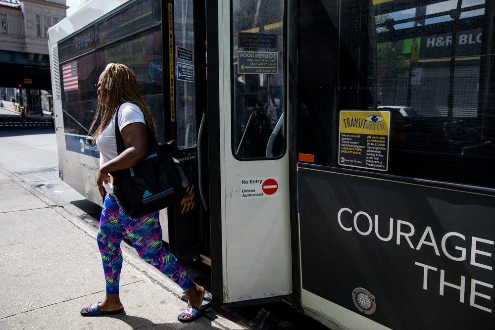 A commuter disembarks from a Bx7 bus at West 231st Street and Broadway. Ahead of a bus network redesign for the borough, transit advocacy groups have issued a list of demands they feel will improve service for commuters in the Bronx.