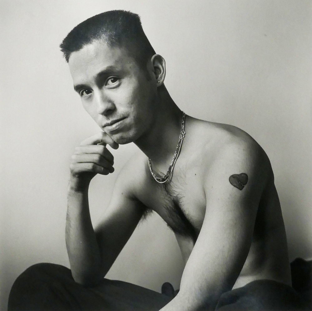 Writer Norman Wong sits for a portrait by Robert Giard in New York City in 1992.