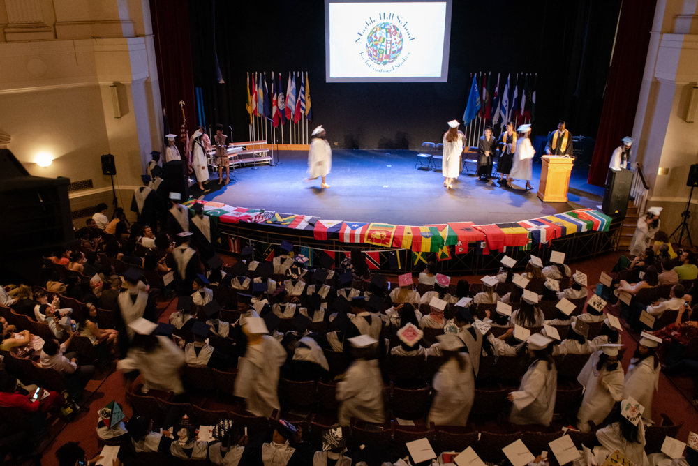 Graduating seniors of Marble Hill School for International Studies are called to the stage to receive their medals in the Hayes Auditorium at the College of Mount Saint Vincent.