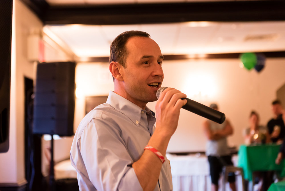 City council candidate Dan Padernacht conducts a trivia game during a campaign fundraising event at Downey’s Bar & Grill that drew about 40 supporters earlier this month.