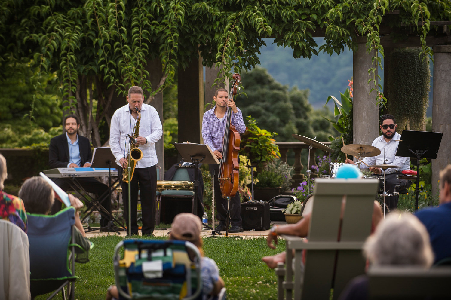 The Mitch Frohman Latin-Jazz Quartet performs at one of Wave Hill’s Sunset Wednesdays concerts in 2014. The garden just wrapped up its summer programming for this past year, and looks ahead to upcoming seasons.