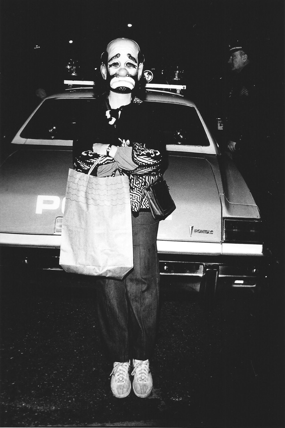 Arlene Gottfried’s photograph of a masked city dweller during the Halloween parade in 1978 is included in ‘After Dark,’ a new exhibition of her work on display at Daniel Cooney Fine Art through Oct. 26.