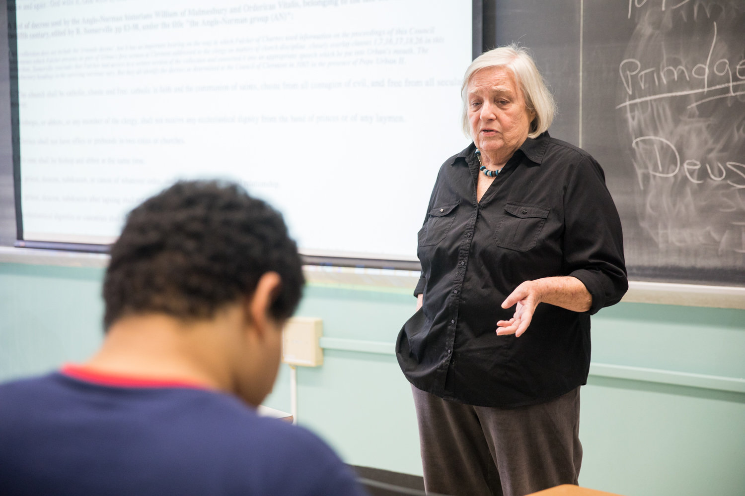 An adjunct professor at Lehman College, Diane Auslander talks with her students at the end of her medieval civilization class. Despite calls for a better contract, Auslander is voting yes on the proposed CUNY collective bargaining contract that exists now because there’s no guarantee protracted union negotiations would yield anything better.