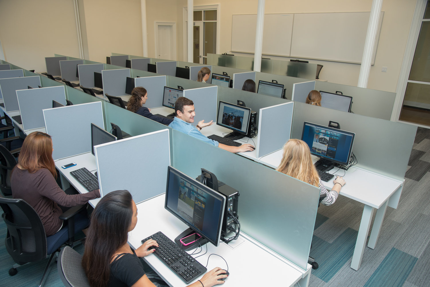 Students research on computers in a new space in Fishlinger Center at the College of Mount Saint Vincent.
