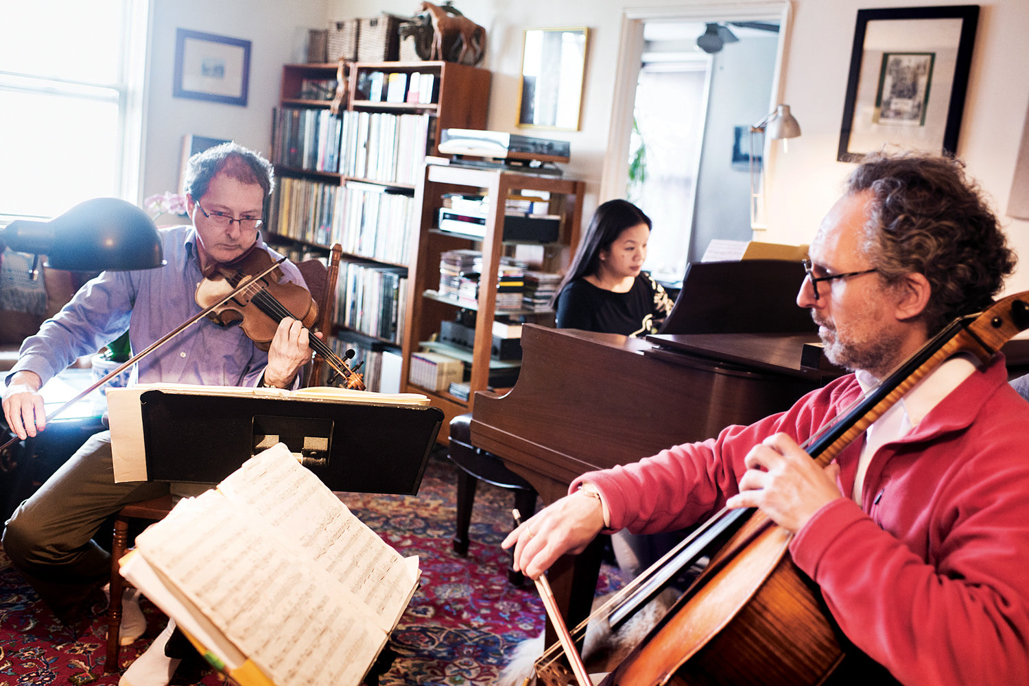 Formed in 2001, the di.vi.sion trio — seen here at a rehearsal in 2015 — will perform a classical music concert at the Riverdale-Yonkers Society for Ethical Culture on Dec. 1.