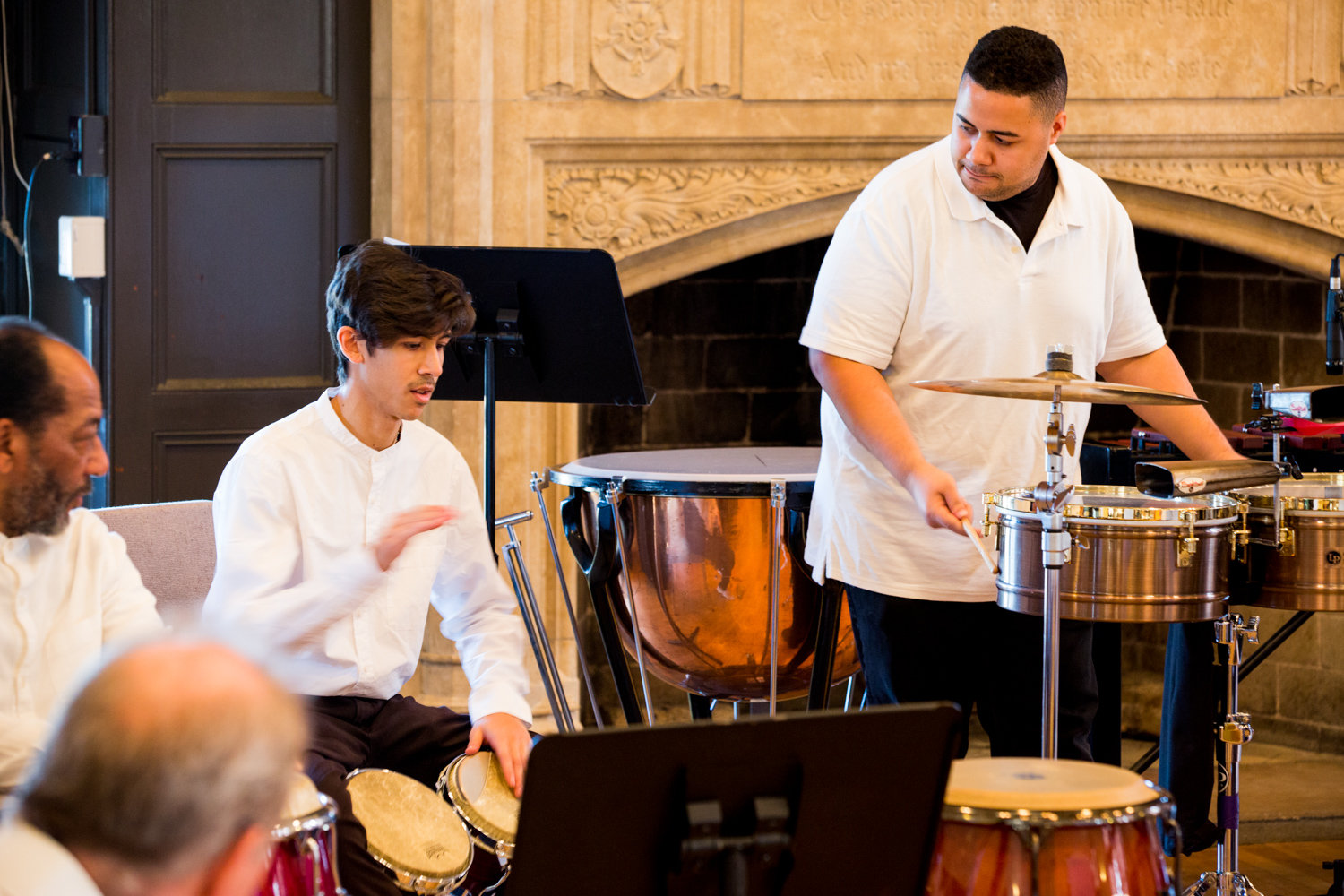 Carlos Colon, right, and Adam Baksh play a song they composed within a 48-hour timeframe prior to their Nov. 21 performance with the Lehman College Percussion Ensemble during the school’s jazz festival.
