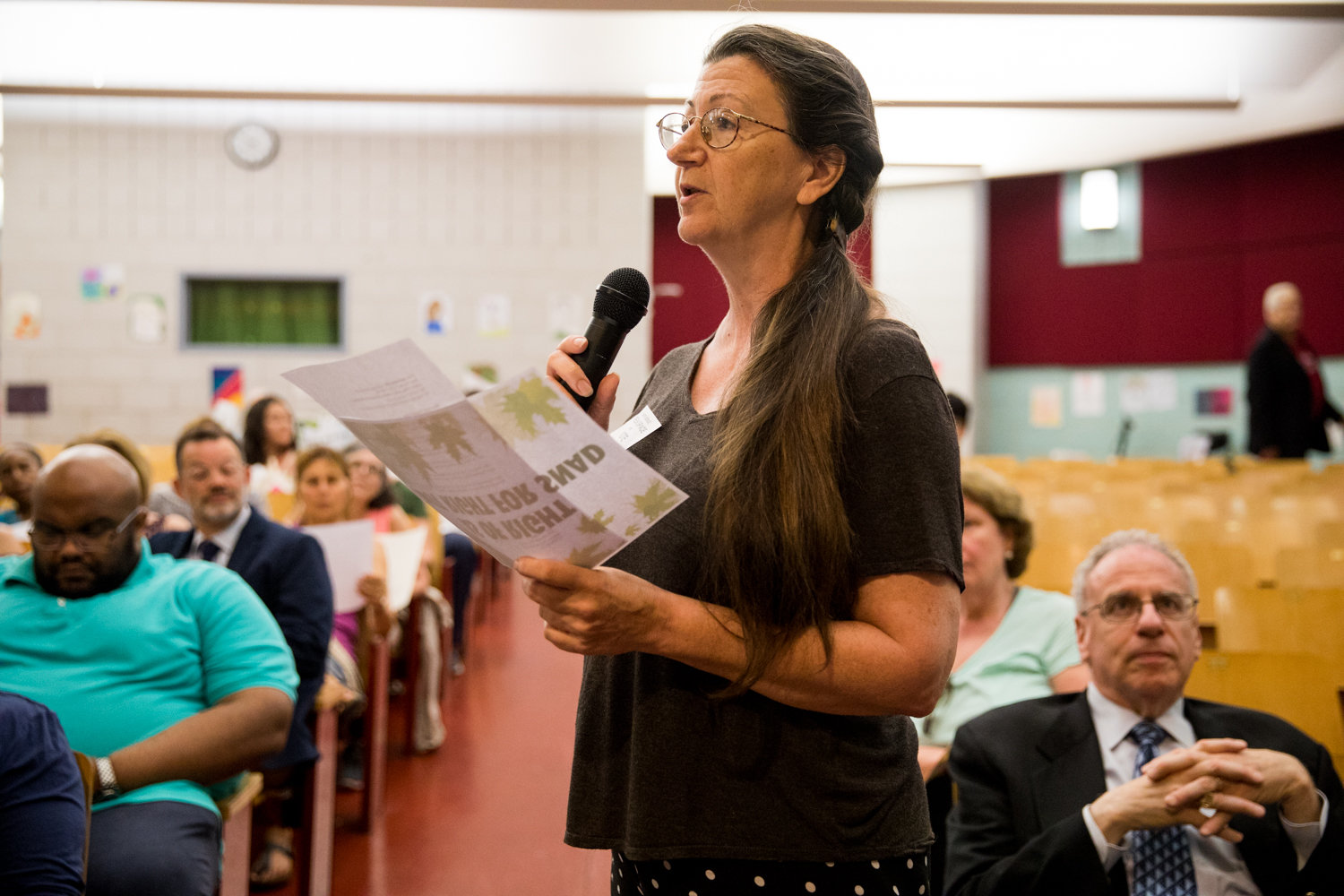 Jodie Colón, seen here at a Community Board 8 meeting last June, has been part of the grassroots effort to save the Villa Rosa Bonheur, a historic apartment building on Palisade Avenue in Spuyten Duyvil.