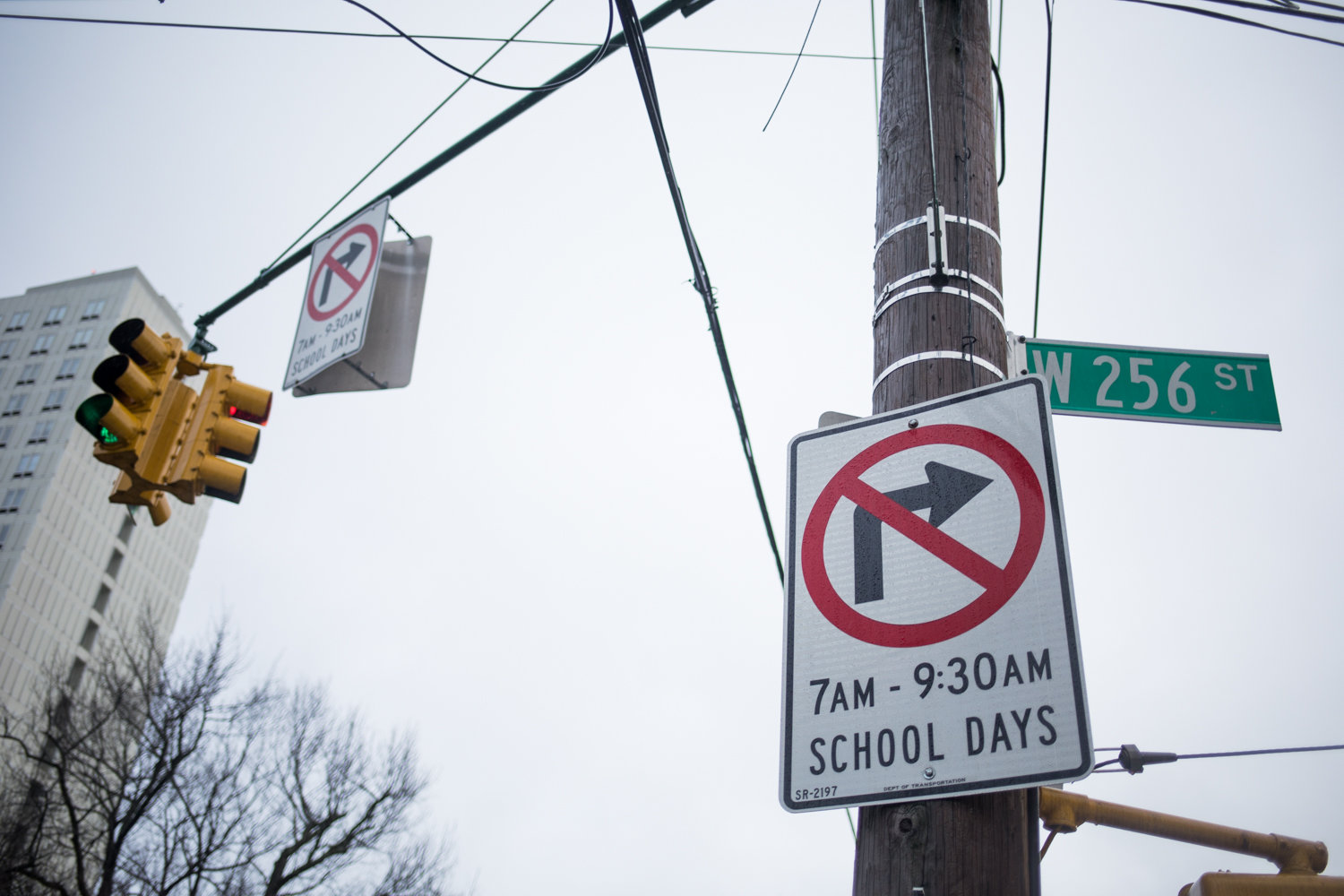 Traffic signs indicate cars cannot turn onto West 256th Street from Mosholu Avenue during early-morning.drop-off on school days. Parents and neighbors have complained of rampant traffic problems during both dropoff and pick-up at P.S. 81 Robert J. Christen School.