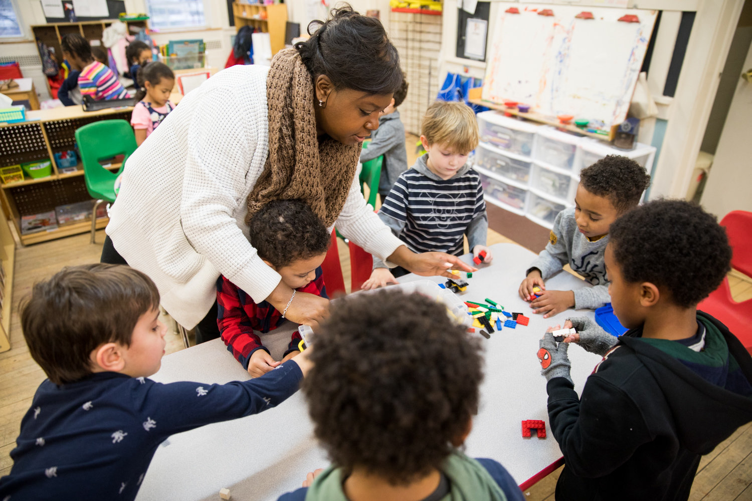 Sabrina Hines helps children play in the after school program at Riverdale Neighborhood House. Hines works as the organization’s after school program director. RNH is currently looking for its next executive director.