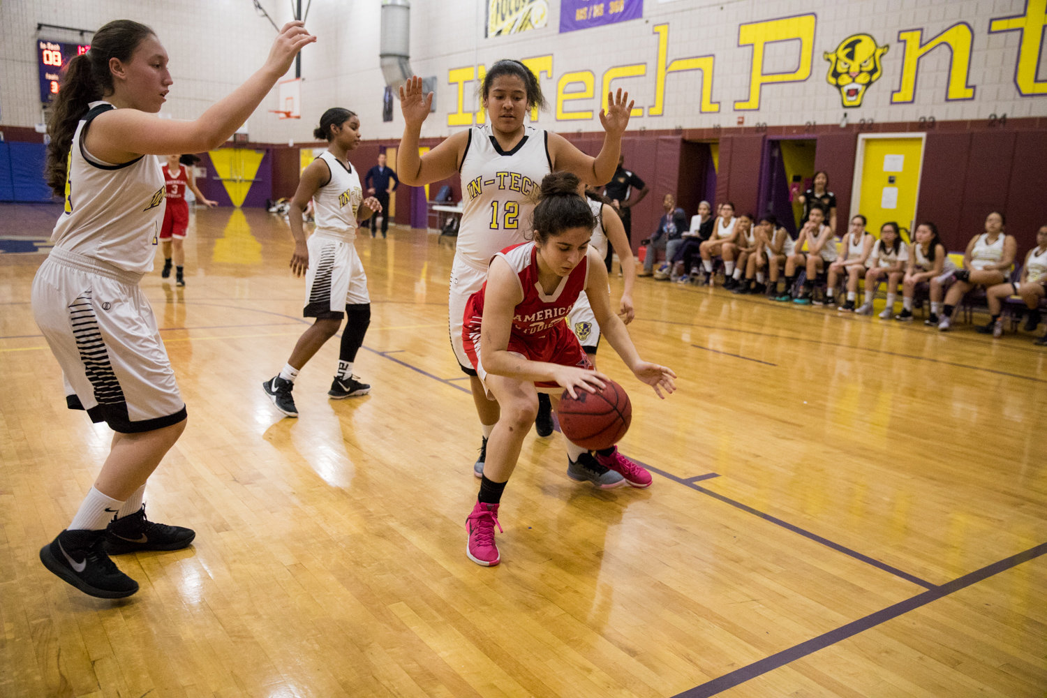 American Studies’ senior Emily Eljamal works her way around several IN-Tech defenders during the Senators recent 54-33 victory, a game which saw her reach the 1,000-point plateau.