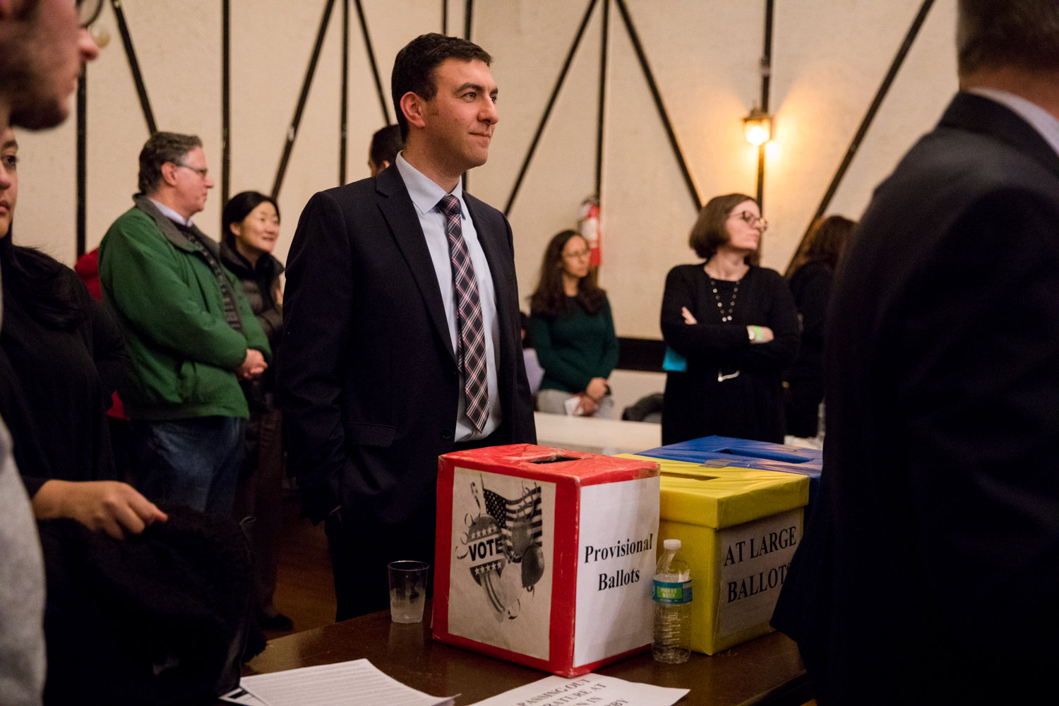 Eric Dinowitz stands near ballot boxes during the Benjamin Franklin Reform Democratic Club’s annual meeting Jan. 29.