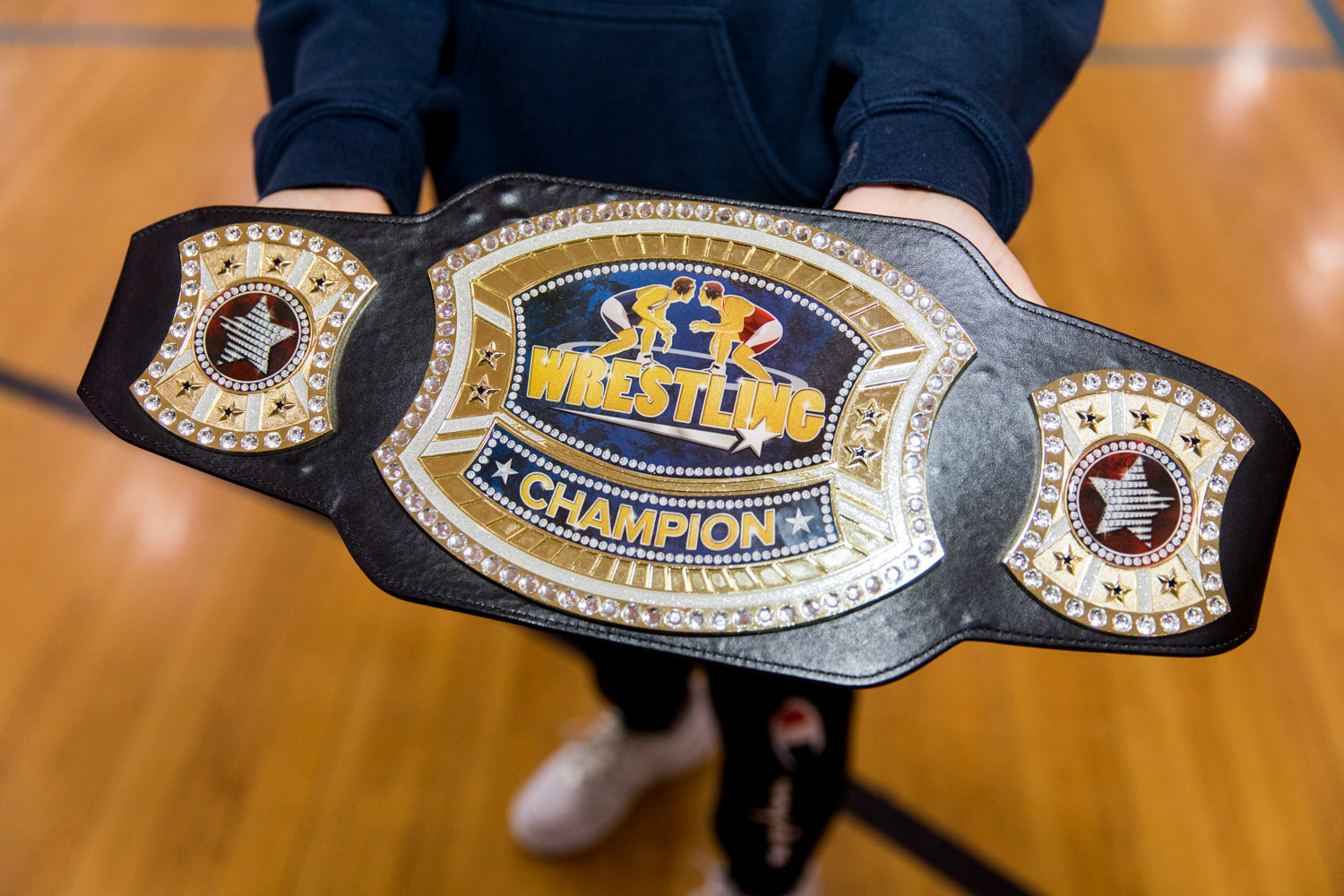 A championship belt is just one of the many trophies the Riverdale/Kingsbridge Academy middle and high school wrestling programs have captured over the past two seasons.