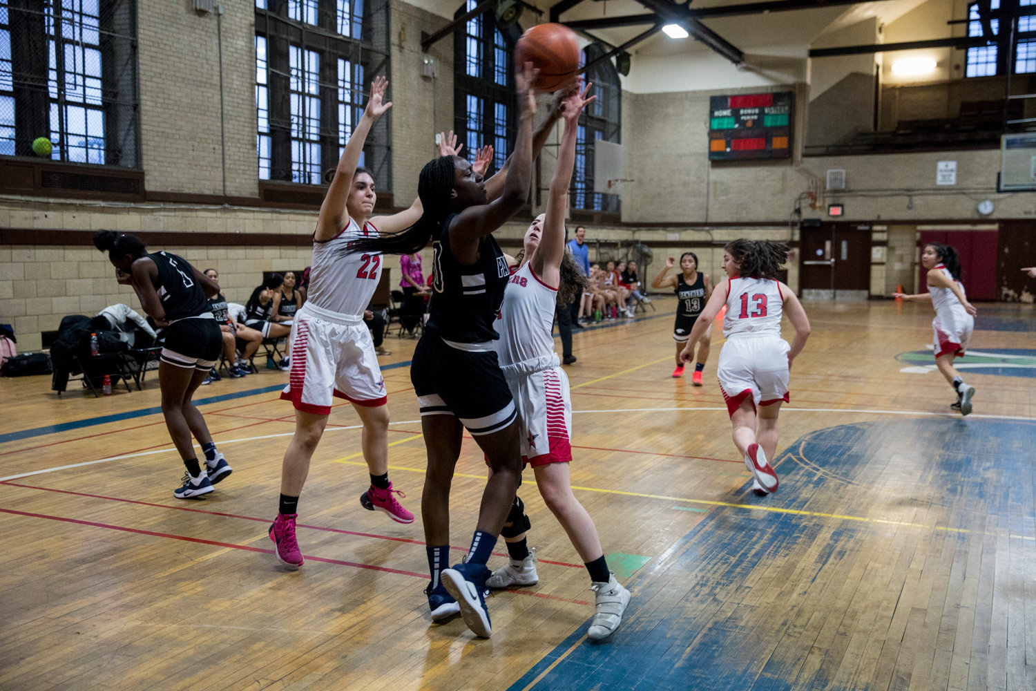 American Studies’ seniors Emily Eljamal (22) and Jacqui Harari put up their best defense against Achievement First Brooklyn, but it wasn’t enough to prevent a 67-55 loss.