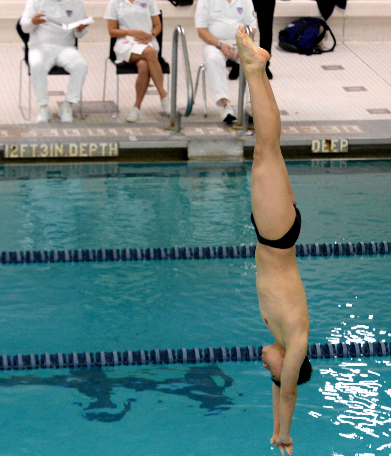 Bronx Science sophomore Richard Gu shows off the form that made him the Public School Athletic League’s diving champion this season.