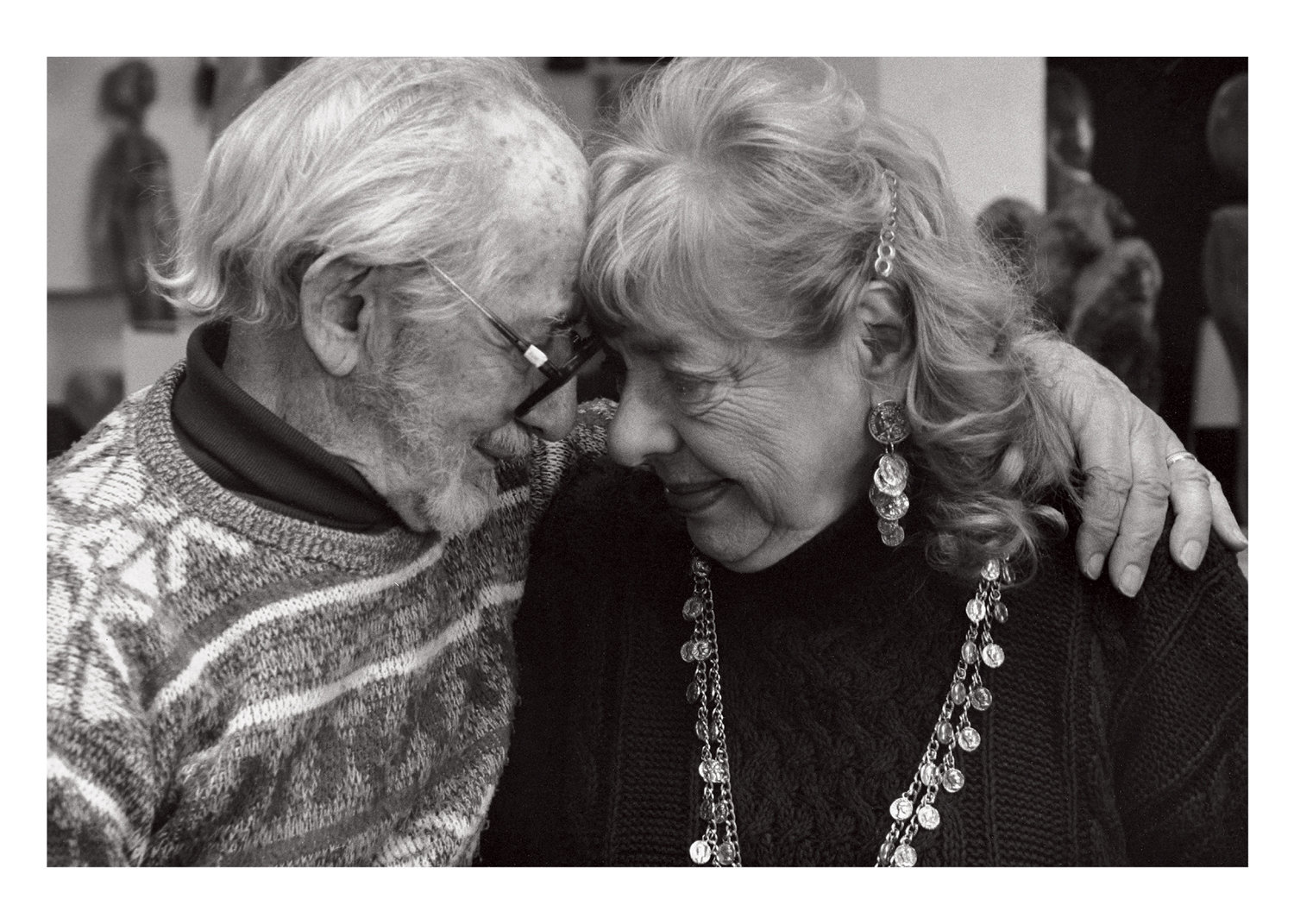 Bernie and Honey, artists who care as much about each other as they do their work, warmly embrace each other for a portrait by Robert Fass, part of the series ‘As Long As We Both Shall Live.’