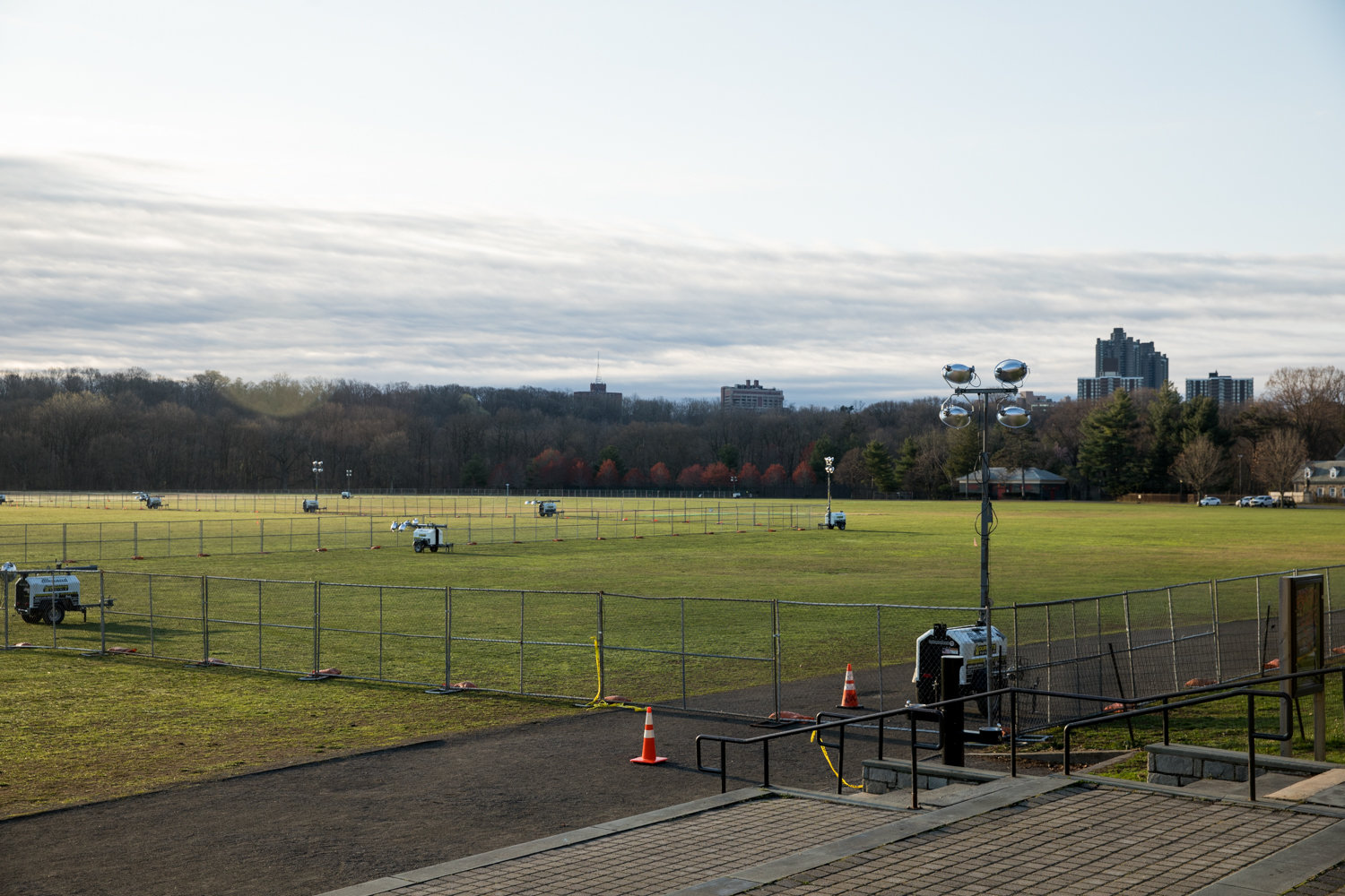 Fencing surrounds the southern third of the Van Cortlandt Park Parade Grounds, which will be the site of a 200-bed COVID-19 field hospital, intended to relieve already at-capacity city hospitals.