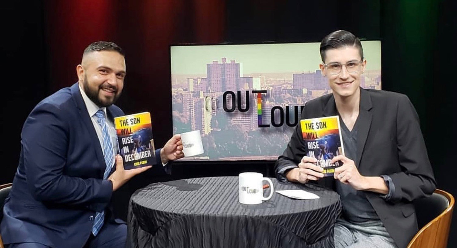 Anthony Parker, right, sits down with local author Eddie Pabon, left, to talk about his novel ‘The Son Will Rise in December,’ for the ‘Out Loud’ television program on BronxNet.