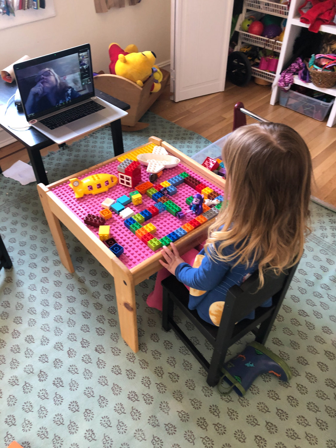 Riverdale Presbyterian Church Nursery School student Luna works with blocks during a virtual class over the videoconferencing app Zoom.