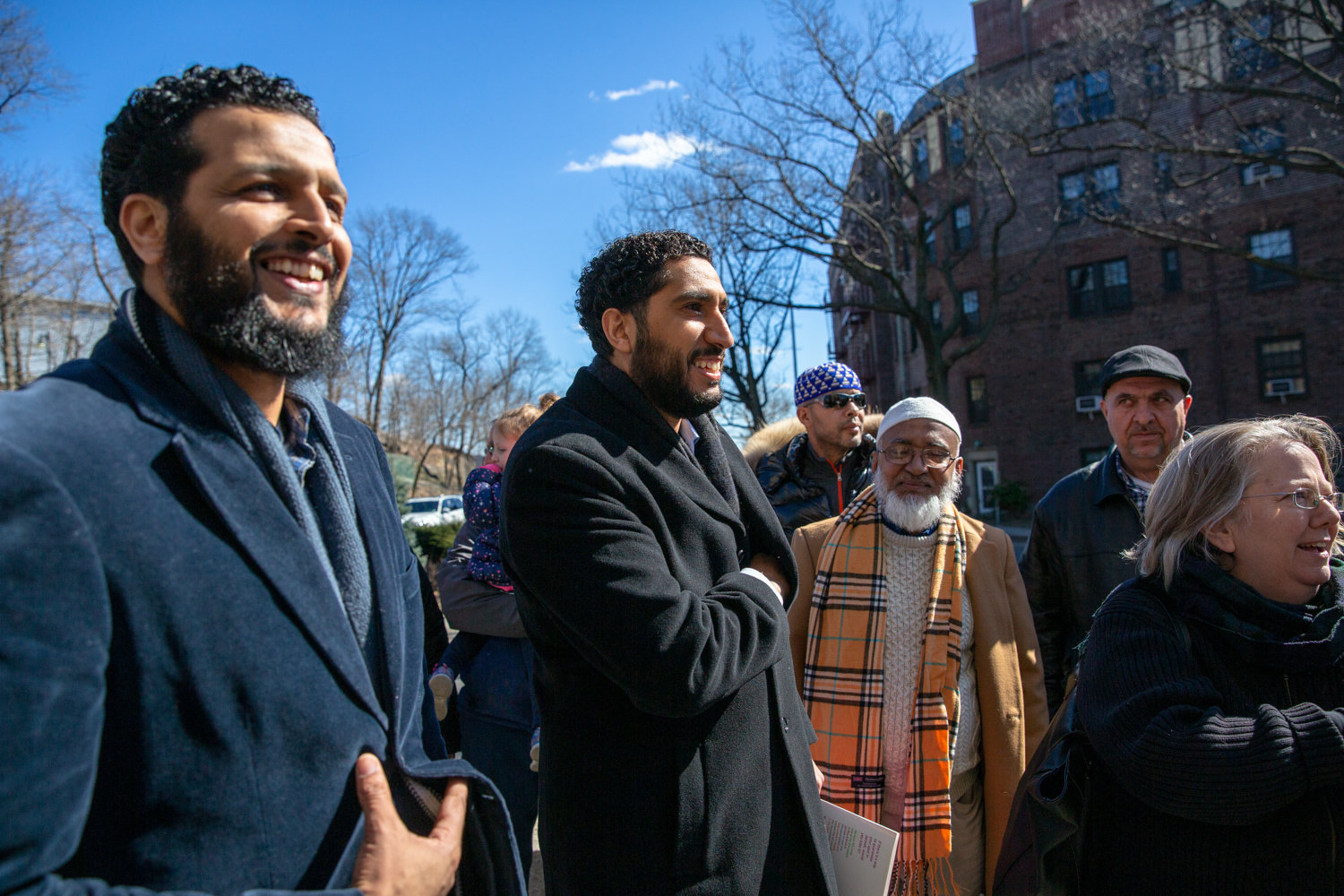 Imam Yassine Taoufik, center, who leads the Abrar, a mosque, in Kingsbridge, attends a vigil last year. Taoufik has found the sense of community among his congregants has grown stronger in the time since the coronavirus pandemic began.