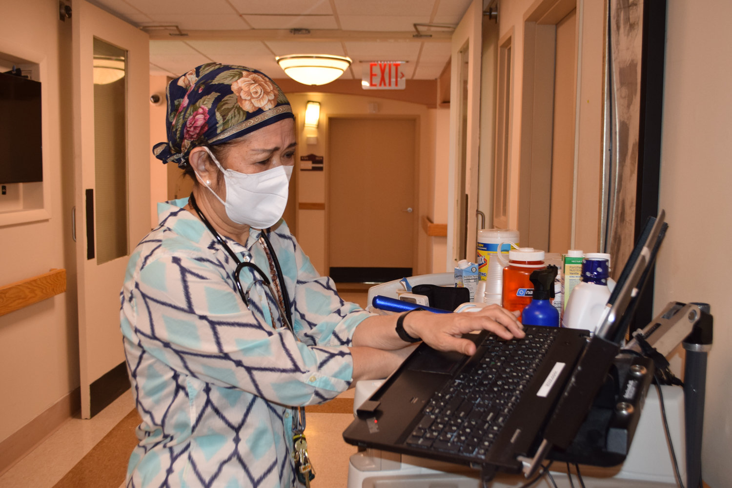 Christine Castro, a nurse at the Hebrew Home at Riverdale, wears personal protective equipment while working her station during the coronavirus pandemic that has claimed 25 lives at the Palisade Avenue facility as of earlier this week.