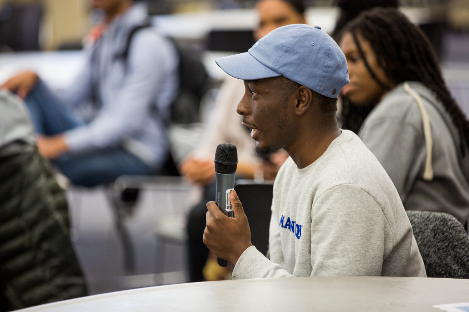 Lehman College student Hussein Abdul talks about mental health issues students deal with during a March 9 forum hosted by CUNY Rising Alliance, which has advocated on behalf of students across the university system.