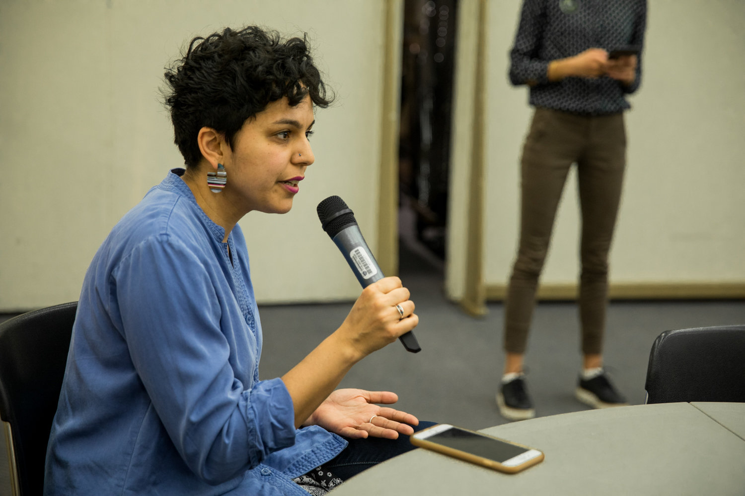 Lehman College English professor Vani Kannan talks about the importance of supporting local community organizations and how access to food is an issue for some CUNY students during a March 9 forum hosted by CUNY Rising Alliance.