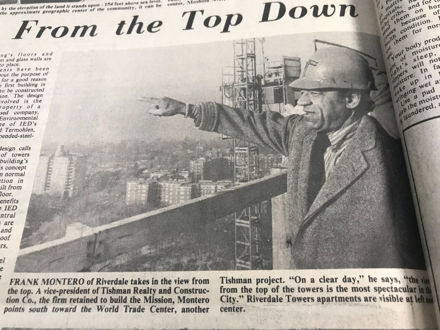 Frank Montero, a vice president with Tishman Realty and Construction Co., points from the barren towers of the Russian Mission in North Riverdale to another one of his company’s projects, the World Trade Center towers 15 miles south in Manhattan. He was joined on this particular trip to the Mosholu Avenue construction site by Riverdale Press features reporter Sol Solomon.