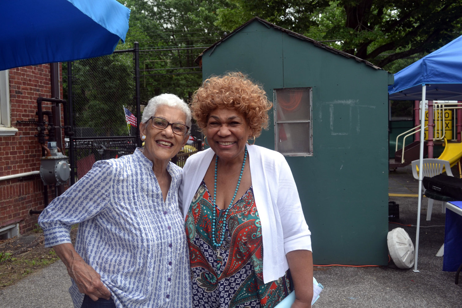 Zenobia Kelly, right, works to ensure homebound senior citizens in and around the community are doing OK, heading up Riverdale Neighborhood House’s telephone reassurance program.