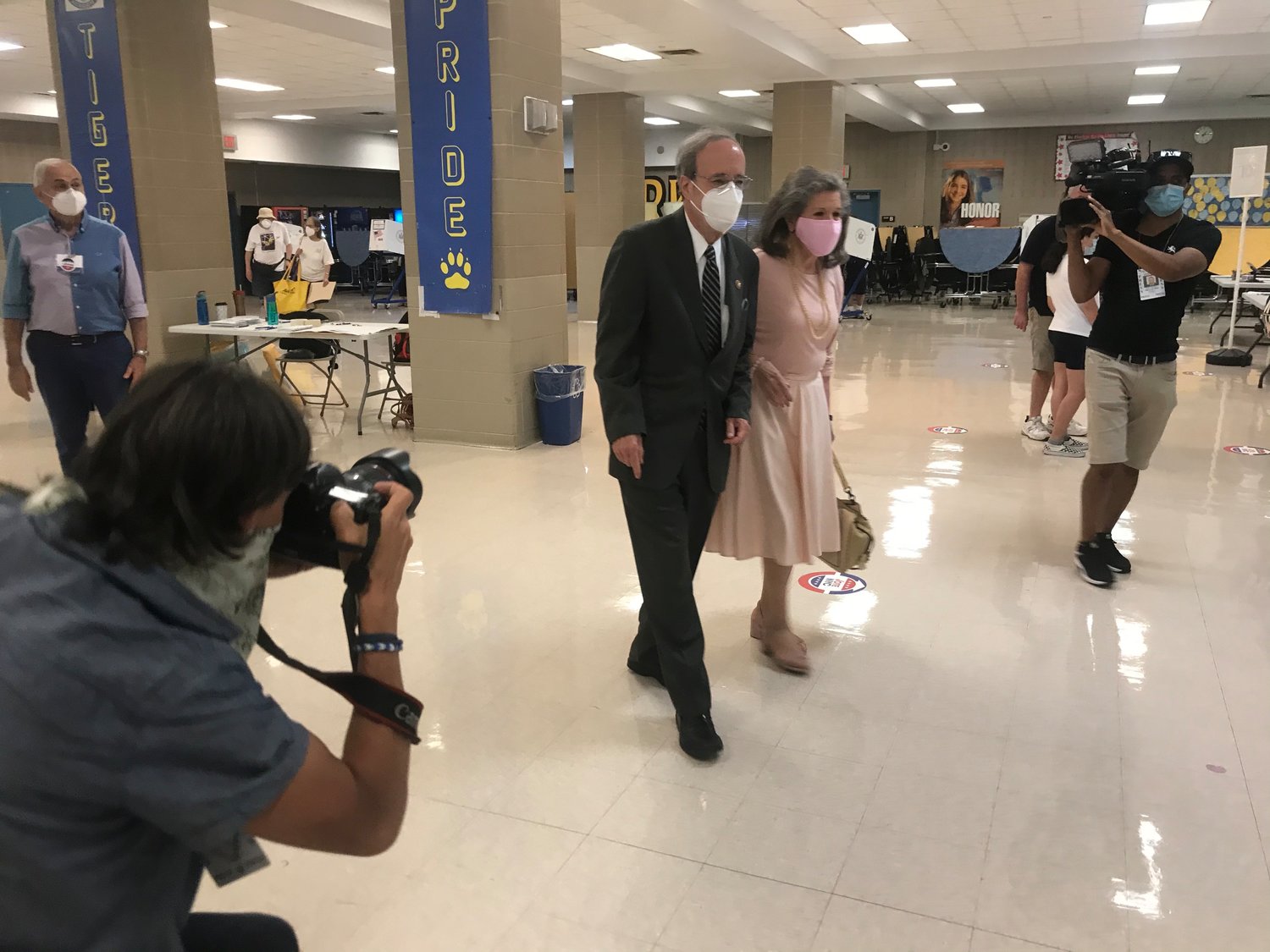 U.S. Rep. Eliot Engel is accompanied by his wife Patricia while casting his ballot at Riverdale/Kingsbridge Academy on Tuesday. Early returns show Engel well behind his primary challenger, Jamaal Bowman.