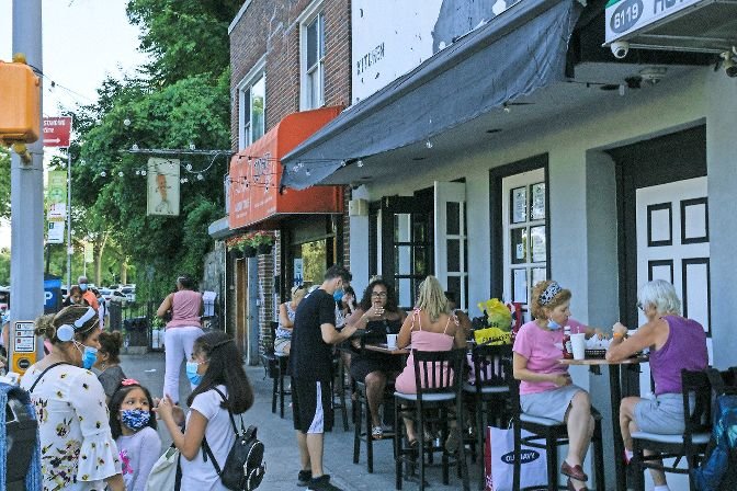 Diners in Riverdale eating outdoors as restaurants open up through Phase II. June 26, 2020