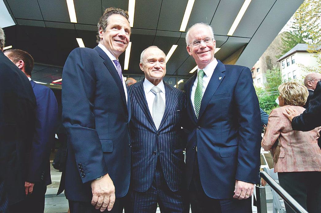 Former New York Police Department commissioner Raymond Kelly, center, is joined by Gov. Andrew Cuomo and Manhattan College president Brennan O’Donnell at the 2014 dedication of the Raymond Kelly Student Commons on Waldo Avenue.