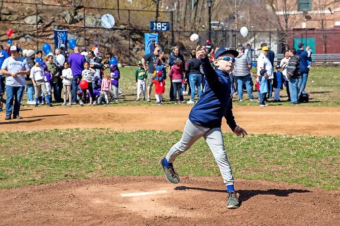 Noah Lieberman throws the first pitch to open the North Riverdale Little League season last year. His peers won’t be as lucky this time around. With no field permits being issued, youth sports leagues across the city won’t get the chance to go up to bat until at least the fall.