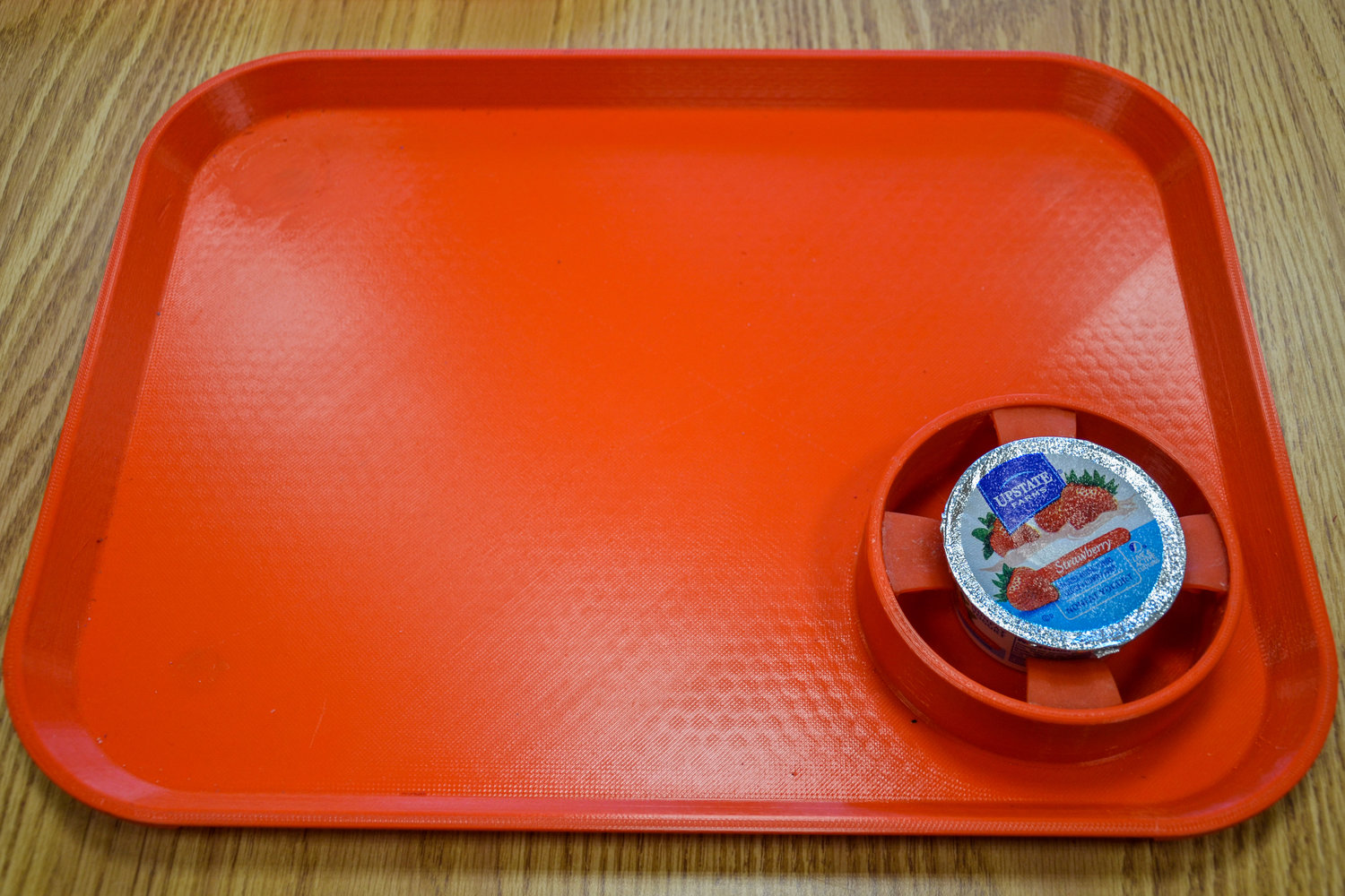 Designed by speech pathologist Ilana Herman, the independent feeding tray features four flaps attached to a molded cup and is meant to help those struggling with neurological and orthopedic injuries eat independently. The tray is still in development. .