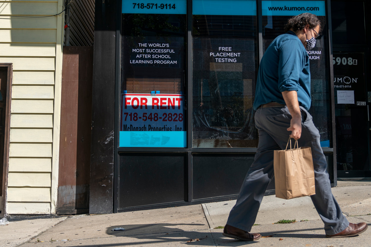 A man walks past the ‘for rent’ sign on the old Kumon center’s window on Riverdale Avenue. The sign might be misleading, however, as this Kumon franchise didn’t go out of business — It just moved next door.