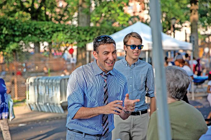 Eric Dinowitz attends National Night Out last month. In his campaign for city council, Dinowitz has raised over $70,000.