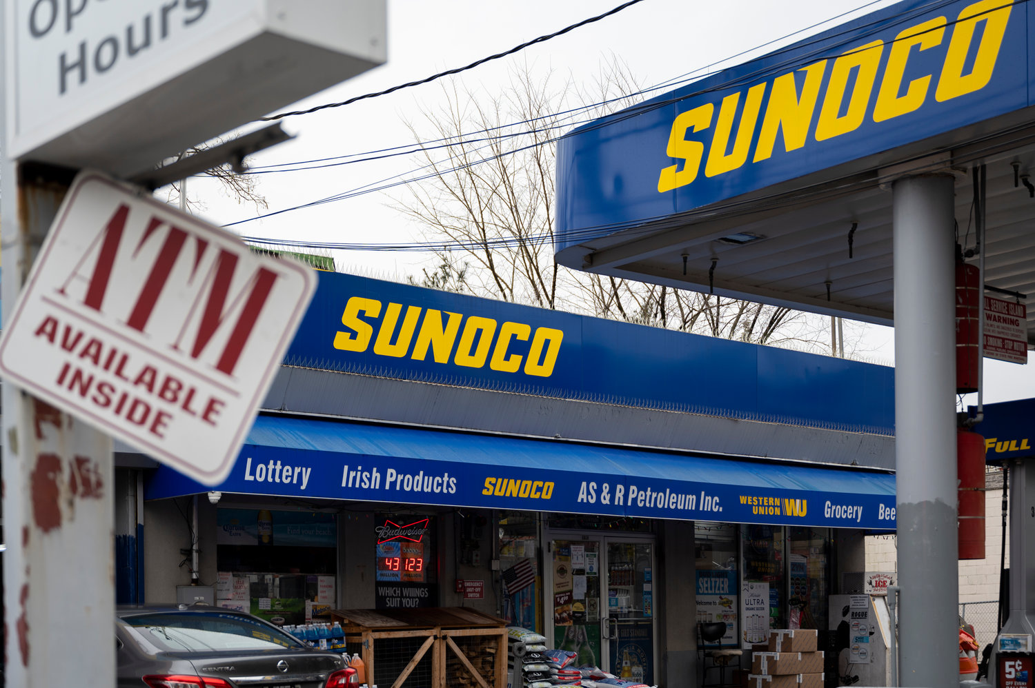 The exterior of Sunoco gas station along Riverdale Ave.