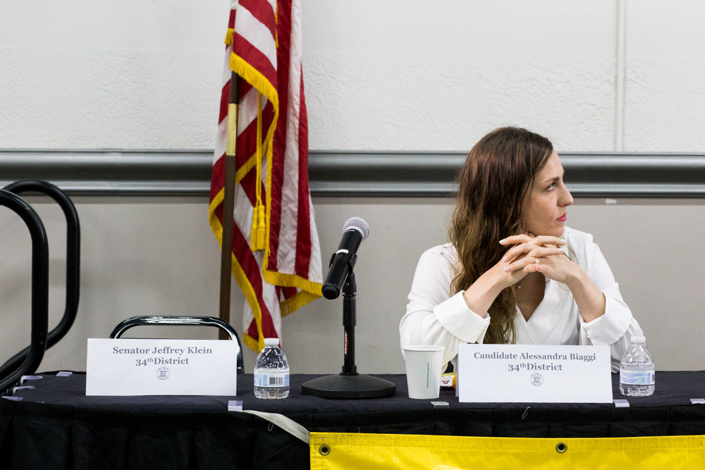 Alessandra Biaggi sits on the panel at a nonpartisan candidates forum held by the Northwest Bronx Community and Clergy Coalition in 2018 after then-state Sen. Jeffrey Klein was a no-show. Biaggi is backing Mino Lora and Jessica Haller in the upcoming city council special election race, blasting Eric Dinowitz for supporting Klein, and thus block the Democrats from taking the majority in the upper chamber.