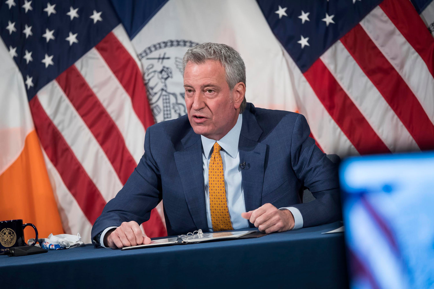 Mayor Bill de Blasio recommends everyone — including those vaccinated — wear masks indoors, but stopped short Monday of calling for a mandate.