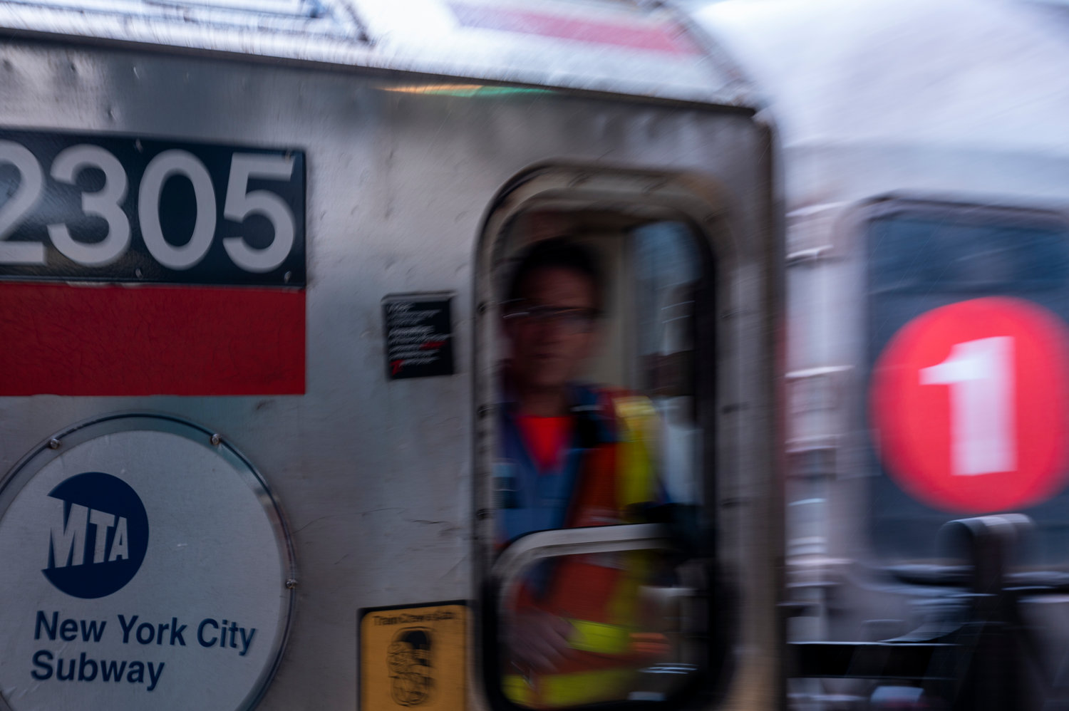 A South Ferry-bound 1 train departs the Van Cortlandt Park-242nd Street station. Subways citywide — including the 1 — will resume 24-hour service after nearly a year of overnight closures.