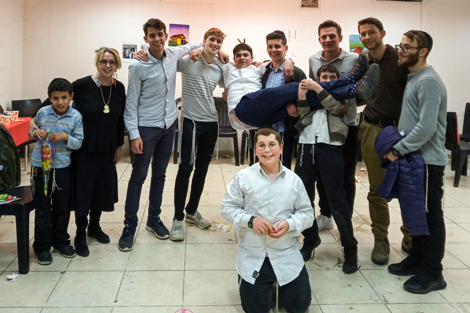 Before the coronavirus pandemic, students from Yeshiva Aish HaTorah’s Aish Gesher visited the Sanhedria Children’s Home in Israel, for an annual Hanukkah party. One of the students in the program, Avi Kroll, was there in 2019, but saddened when the party was canceled in 2020 because of the pandemic.