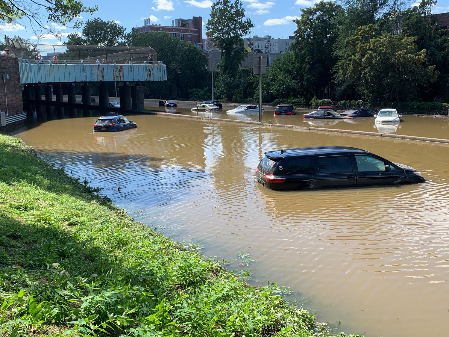 Large sections of the Major Deegan Expressway was shut down through Kingsbridge after massive flooding turned the expressway into river. Cars, trucks and even tour buses were abandoned along the way.